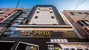 A modern hotel building with a prominent sign for 'HOTEL ZAVOLLE'. - Zavolle Hotel (Suwon)