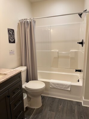 Hair dryer, towels, soap, toilet paper