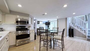 Coffee/tea maker, fridge, microwave, oven