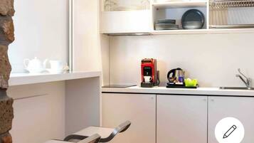 Fridge, stovetop, electric kettle, toaster