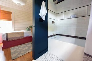 Shower, hair dryer, towels, shampoo