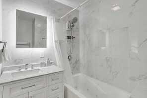 Hair dryer, towels, soap, toilet paper