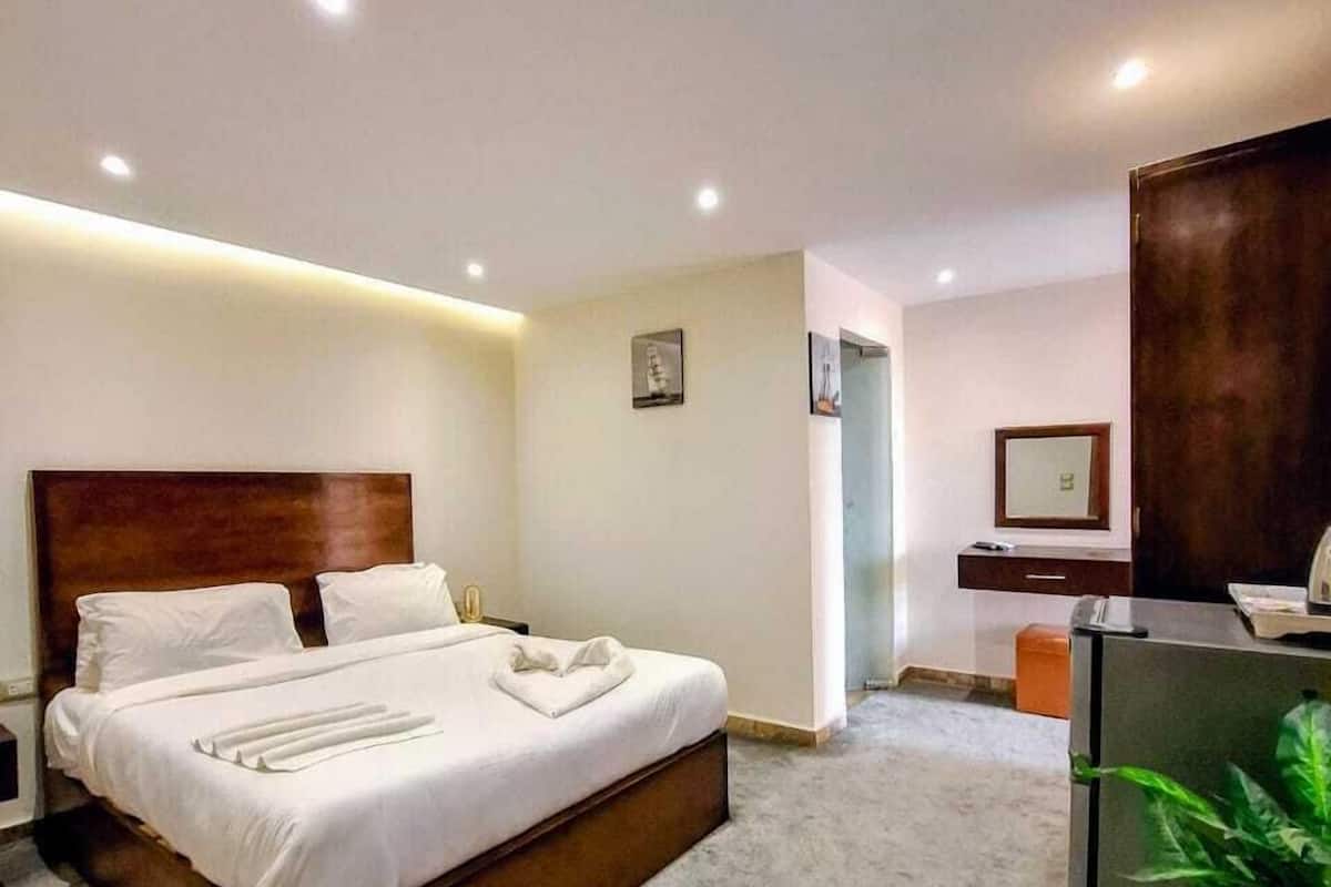 Sábanas de algodón egipcio, ropa de cama de alta calidad y minibar