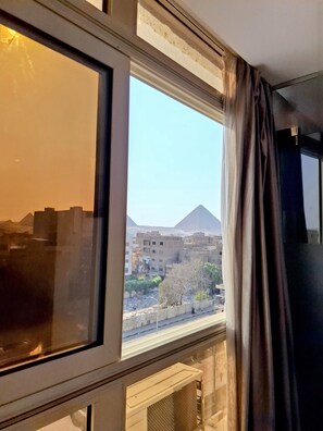 Egyptian cotton sheets, premium bedding, minibar, in-room safe