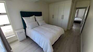 2 dormitorios, tabla de planchar con plancha, wifi y ropa de cama