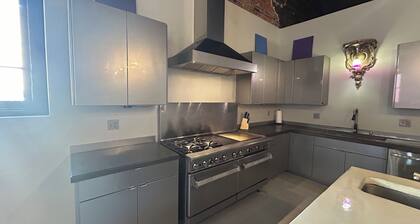 Modern 3000sf 4-bedroom loft in historic Downtown Fort Scott