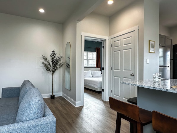 Apartment | Living area | 58-inch Smart TV with digital channels - StayAE - Flamingo House (Baton Rouge)