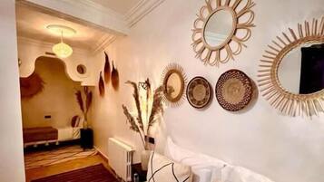 Deluxe Triple Room | Desk, laptop workspace, blackout curtains, free WiFi