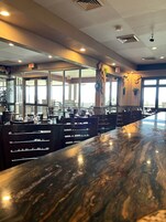 Lunch, dinner served; American cuisine, golf course views 