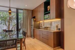 Fridge, microwave, stovetop, coffee/tea maker