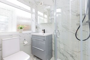 Hair dryer, towels, soap, shampoo