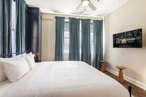 2 habitaciones, tabla de planchar con plancha y ropa de cama