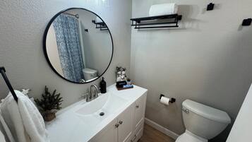 Hair dryer, towels, soap, toilet paper