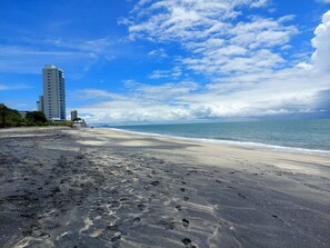 On the beach, sun-loungers, beach towels