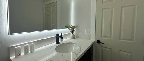 Hair dryer, towels, soap, shampoo