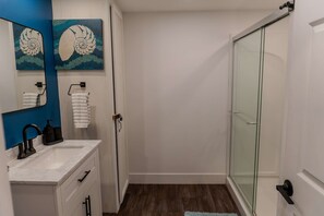 Hair dryer, towels, soap, shampoo