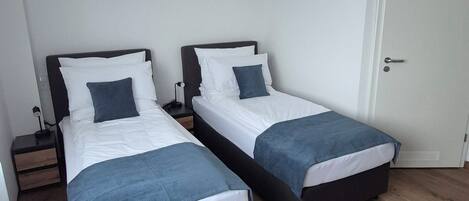 1 Schlafzimmer, Reisekinderbett, kostenloses WLAN, Bettwäsche