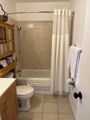 Hair dryer, towels, soap, toilet paper