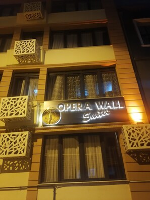 A building with a sign that reads "OPERA WALL Suites." - Opera Wall Suite (Istanbul)