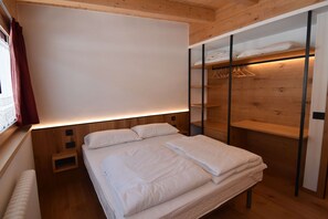 2 dormitoris i roba de llit