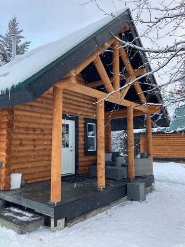 Log lofted rustic cabin in woods