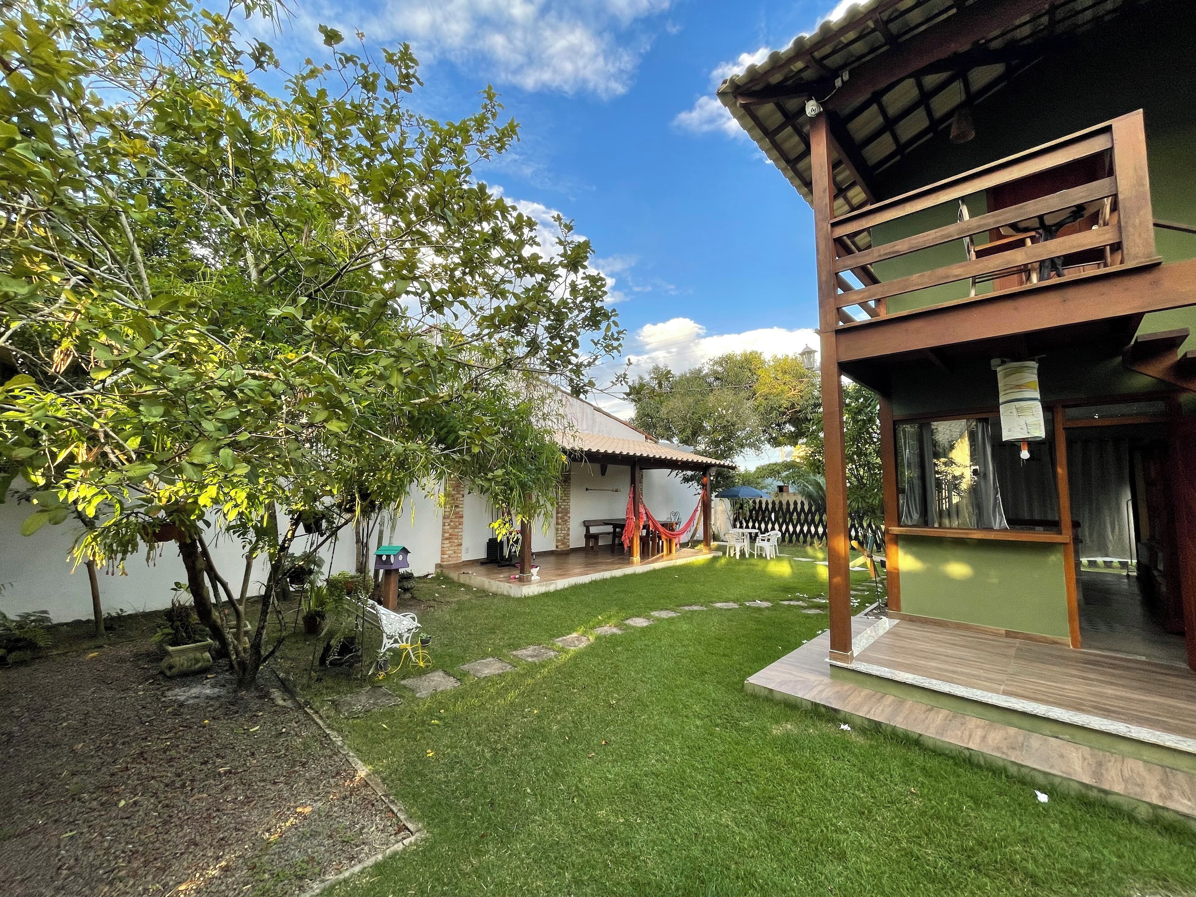 Suíte superior, sacada, vista para o jardim | Terraço/pátio