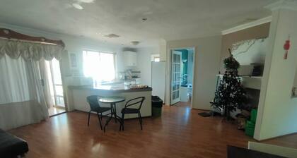 Joondalup Villa with five bedrooms and two bathrooms, can accommodate 10 people