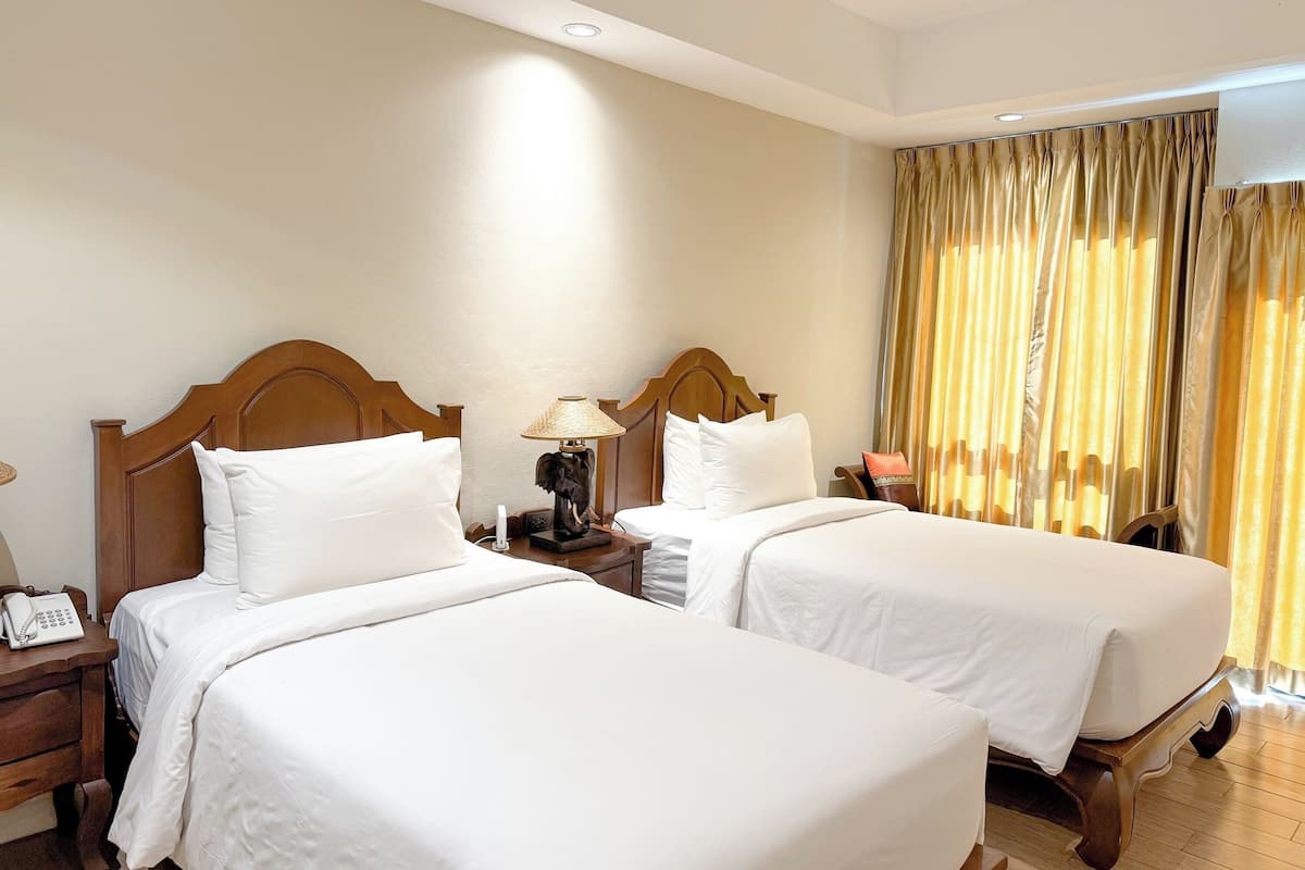 Standaard Twin kamer | Een bureau, gratis wifi, beddengoed