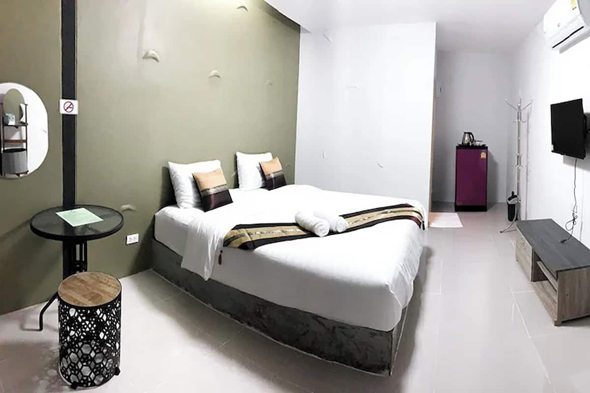 Deluxe King Room | Escritorio, wifi gratis y ropa de cama