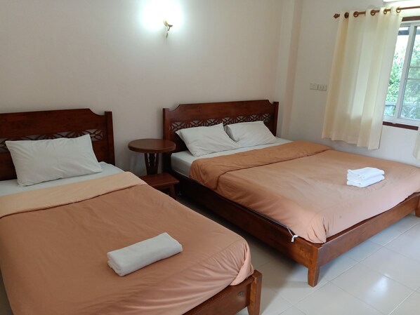 Family Room | Desk, blackout drapes, free WiFi, bed sheets - Phumchan Place Hotel (Phayao)