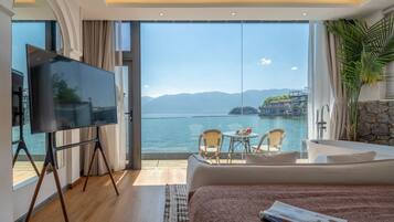 Deluxe Double Room, Sea View | Bathroom | Hair dryer, slippers, towels, soap