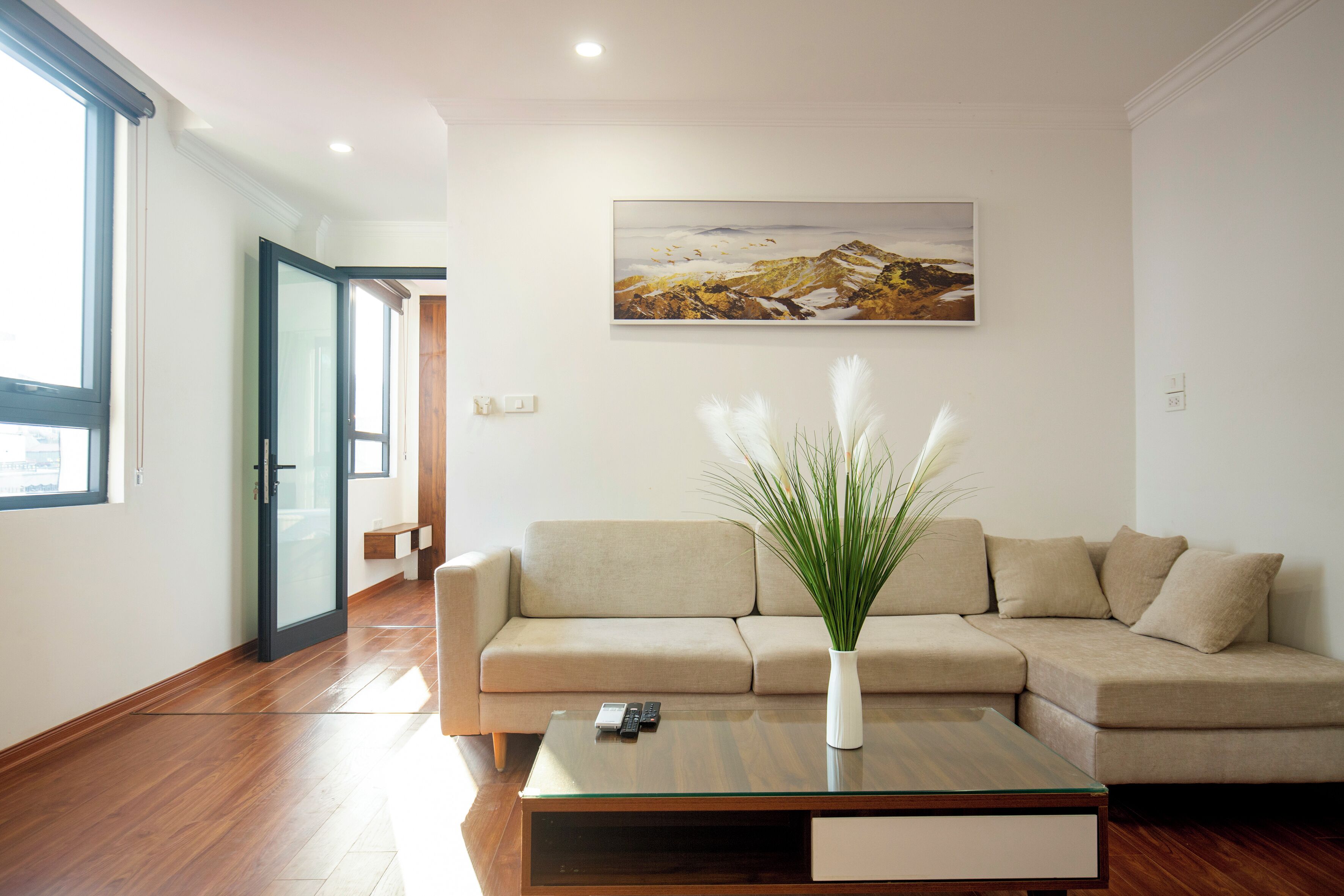 City Apartment | Living area | 50-inch TV with premium channels