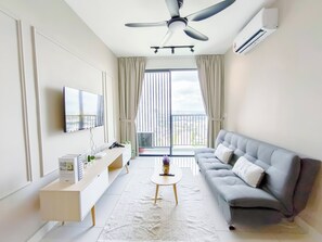 Departamento Deluxe, 2 habitaciones | Área de sala de estar