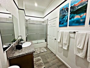 Hair dryer, towels, soap, toilet paper