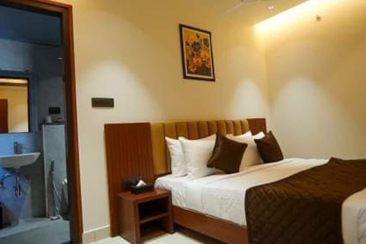 Habitación Deluxe, vista a la ciudad | Wifi gratis