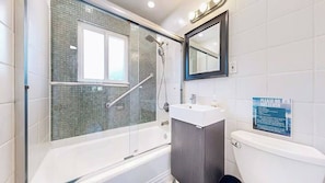 Shower, eco-friendly toiletries, hair dryer, towels