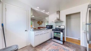 Fridge, microwave, oven, stovetop - Bohemian 5-bedroom house in charming Arvada with AC, gorgeous yard, fire pit... (Arvada)