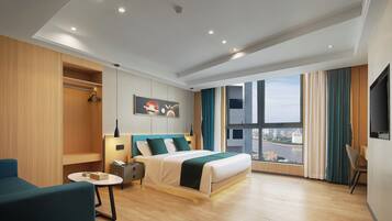 Premium bedding, Select Comfort beds, desk, laptop workspace