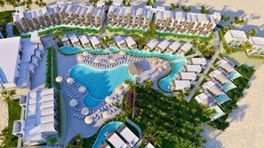Relax by the central pool surrounded by sun loungers and shaded areas, with access to the sandy beach.