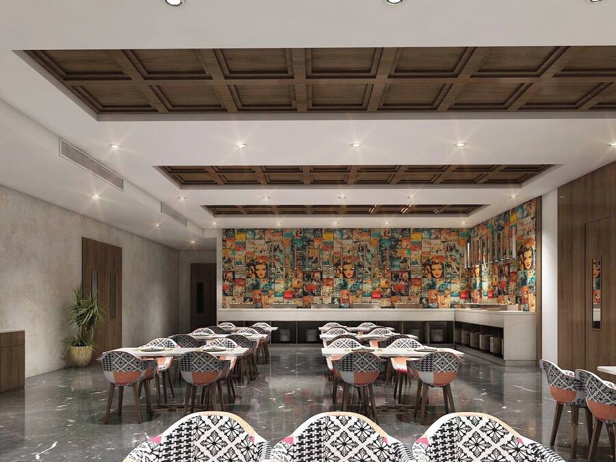 A spacious conference room with a high ceiling, wooden paneling, and a large mural on the back wall. Tables and chairs are arranged for meetings.