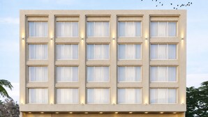 A modern building with a symmetrical facade, large windows, and a central entrance with steps. - Zone Connect by The Park Prayagraj (Prayagraj)