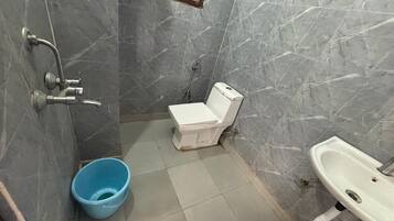 Shower, free toiletries, towels, soap