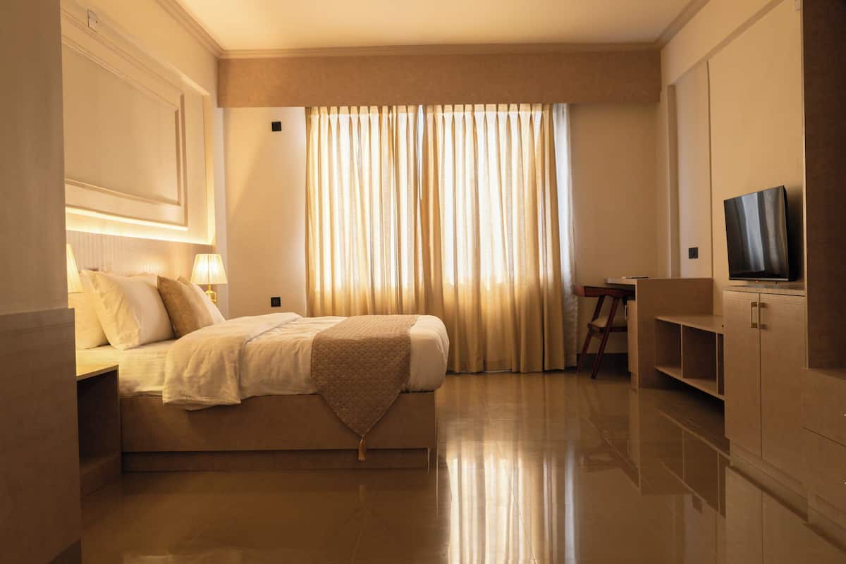 Suite Exécutive, vue ville | 1 chambre, chambres insonorisées, fer et planche à repasser