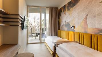Hypoallergeen beddengoed, een minibar, een kluis op de kamer, een bureau