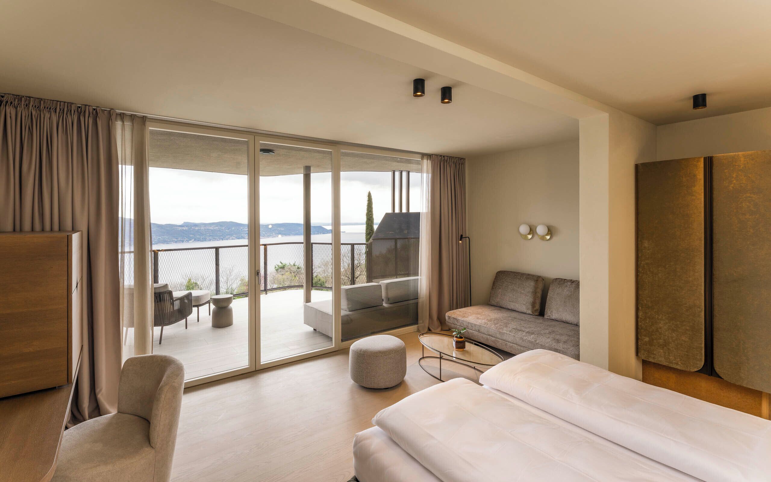 Junior Triple Room, Balcony, Lake View | Hypo-allergenic bedding available, minibar, in-room safe, desk