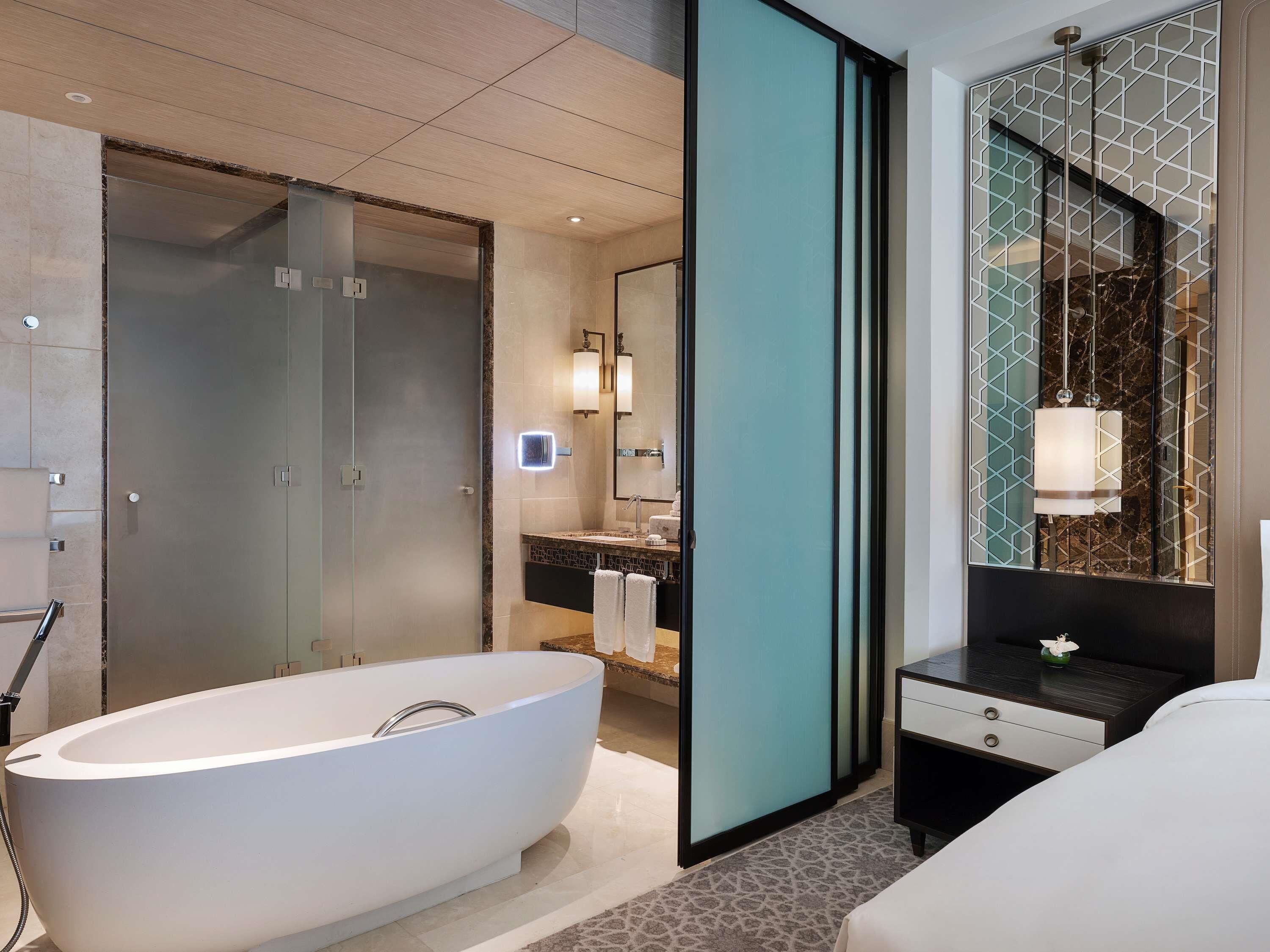 Separate tub and shower, deep soaking tub, hair dryer, bathrobes