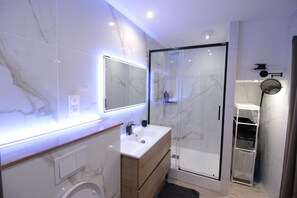 Shower, hair dryer, towels, soap