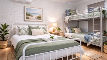 4 bedrooms, desk, iron/ironing board, travel cot