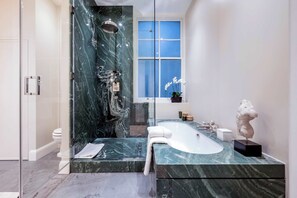 Shower, hair dryer, towels
