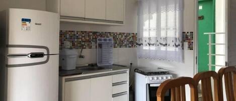 Comfort Apartment, Balcony, Sea View | Private kitchen | Full-size fridge, oven, electric kettle, cookware/dishes/utensils